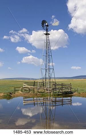 Reflection of an industrial windmill in water, Wyoming, USA View Large Photo Image Stock Image - Reflection of an industrial windmill in water, Wyoming, USA. Fotosearch
