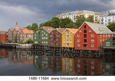 Reflection of warehouses in water, Bryggen, Trondheim, Trondelag County, Trondelag, Norway View Large Photo Image Picture - Reflection of warehouses in water, Bryggen, Trondheim, Trondelag County, Trondelag, Norway. Fotosearch