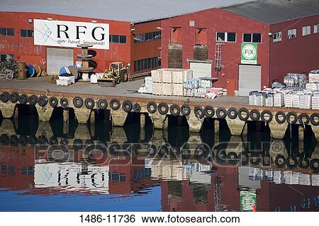 Reflection of warehouses in water, Tromso, Toms County, Nord-Norge, Norway View Large Photo Image Stock Photograph - Reflection of warehouses in water, Tromso, Toms County, Nord-Norge, Norway. Fotosearch
