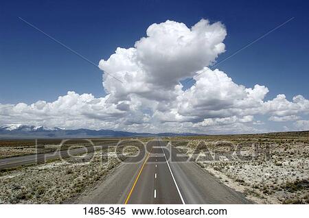 Road passing through a landscape View Large Photo Image Stock Photography - Road passing through a landscape. Fotosearch