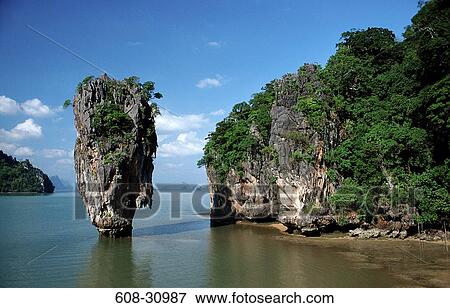Stock Photo - Rock formation in the sea, James Bond Island, Phuket, Thailand. Fotosearch
