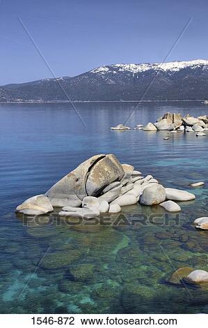 Rocks in a lake, East Shore, Lake Tahoe, Nevada, USA View Large Photo Image Stock Image - Rocks in a lake, East Shore, Lake Tahoe, Nevada, USA. Fotosearch