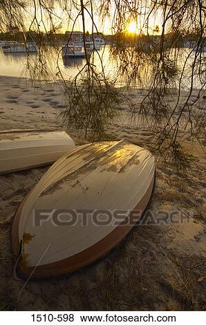 Rowboats on the beach, Queensland, Australia View Large Photo Image Stock Photo - Rowboats on the beach, Queensland, Australia. Fotosearch