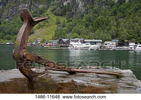 Rusty anchor on a pier, Geiranger, Geirangerfjord, More og Romsdal, Sunnmore, Norway View Large Photo Image Stock Photo - Rusty anchor on a pier, Geiranger, Geirangerfjord, More og Romsdal, Sunnmore, Norway. Fotosearch