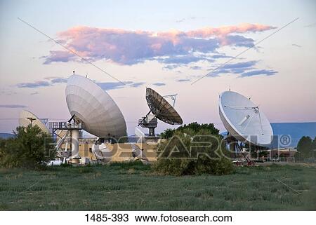Stock Image - Satellite dishes in a field, Grand Junction, Mesa County, Colorado, USA. Fotosearch