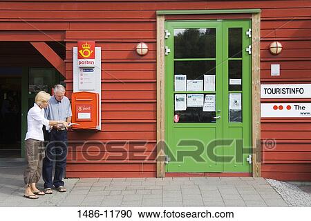 Senior couple reading a tourist map, Flam, Aurlandsfjord, Sogn Og Fjordane, Norway View Large Photo Image Stock Image - Senior couple reading a tourist map, Flam, Aurlandsfjord, Sogn Og Fjordane, Norway. Fotosearch