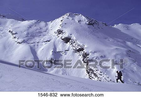 Silhouette of a man ski mountaineering View Large Photo Image Stock Image - Silhouette of a man ski mountaineering. Fotosearch