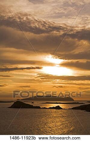Silhouette of Islands in an ocean, Slea Head, Blasket Islands, Dingle Peninsula, County Kerry, Munster Province, Ireland View Large Photo Image Stock Image - Silhouette of Islands in an ocean, Slea Head, Blasket Islands, Dingle Peninsula, County Kerry, Munster Province, Ireland. Fotosearch