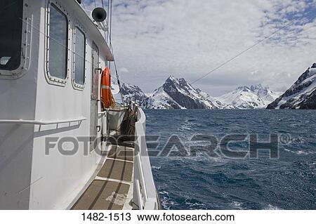 Stock Image - sky, snow, water, cloud, sea, mountain, day. Fotosearch