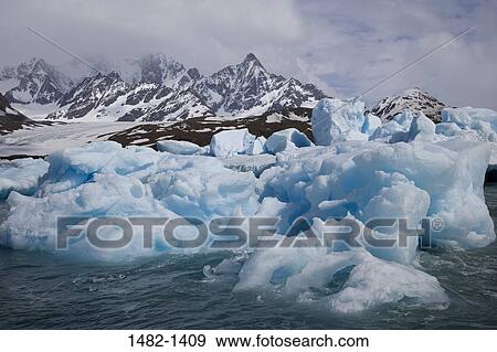 Stock Photo - sky, snow, water, cloud, sea, ocean, mountain. Fotosearch