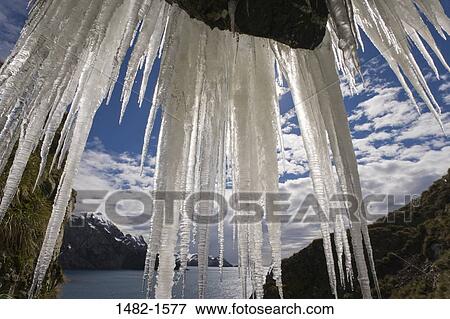sky, water, cloud, hanging, sea, ice, day View Large Photo Image Stock Photo - sky, water, cloud, hanging, sea, ice, day. Fotosearch