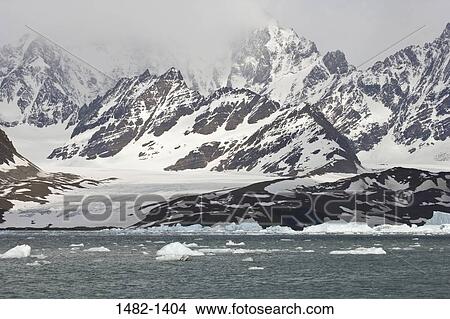 snow, floating, water, cloud, fog, sea, mountain View Large Photo Image Picture - snow, floating, water, cloud, fog, sea, mountain. Fotosearch