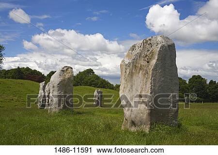 Stock Image - Stones in a field, Stone Circle, Avebury, Wiltshire, England. Fotosearch