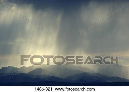 Storm clouds over mountains, South Schell Peak, Nevada, USA View Large Photo Image Stock Image - Storm clouds over mountains, South Schell Peak, Nevada, USA. Fotosearch