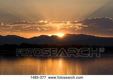 Stock Photo - Sunset over mountains, Rocky Mountains, Colorado, USA. Fotosearch
