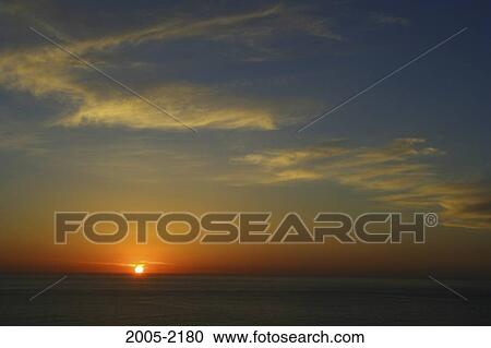 Sunset over the ocean, Big Sur, California, USA View Large Photo Image Stock Image - Sunset over the ocean, Big Sur, California, USA. Fotosearch