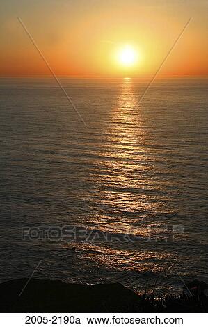 Sunset over the ocean, Big Sur, California, USA View Large Photo Image Stock Image - Sunset over the ocean, Big Sur, California, USA. Fotosearch