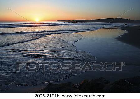 Sunset over the ocean, Big Sur, California, USA View Large Photo Image Stock Image - Sunset over the ocean, Big Sur, California, USA. Fotosearch