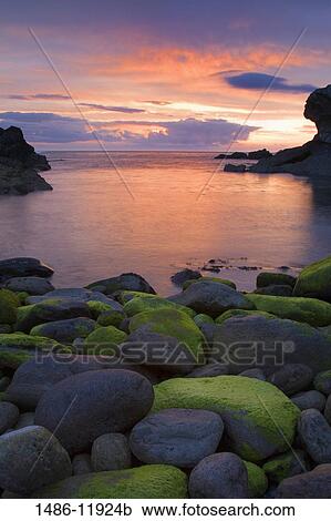 Sunset over the ocean, Clogher Head, Dingle, Dingle Peninsula, County Kerry, Munster Province, Ireland View Large Photo Image Stock Image - Sunset over the ocean, Clogher Head, Dingle, Dingle Peninsula, County Kerry, Munster Province, Ireland. Fotosearch