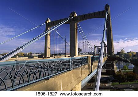 Suspension bridge across a river, Hennepin Avenue Bridge, Minneapolis, Hennepin County, Minnesota, USA View Large Photo Image Stock Photo - Suspension bridge across a river, Hennepin Avenue Bridge, Minneapolis, Hennepin County, Minnesota, USA. Fotosearch