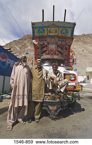 Three Pakistani truck drivers in front of an ornate truck, Karakoram Highway, Pakistan View Large Photo Image Stock Photo - Three Pakistani truck drivers in front of an ornate truck, Karakoram Highway, Pakistan. Fotosearch
