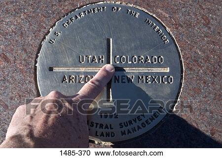 Traveler's finger on a monument, Four Corners, USA View Large Photo Image Stock Image - Traveler's finger on a monument, Four Corners, USA. Fotosearch