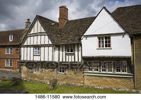 Tudor style houses in a row, Lacock, Wiltshire, England View Large Photo Image Stock Image - Tudor style houses in a row, Lacock, Wiltshire, England. Fotosearch