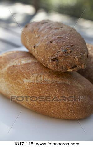 Two breads on a table View Large Photo Image Stock Photography - Two breads on a table. Fotosearch