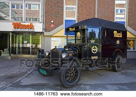 Stock Image - Vintage delivery truck in front of a brewery, Tromso, Toms County, Nord-Norge, Norway. Fotosearch