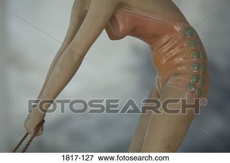 Vintage figurine of a woman surfing View Large Photo Image Stock Photo - Vintage figurine of a woman surfing. Fotosearch