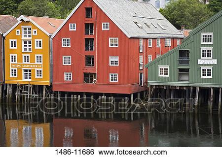 Stock Photograph - Warehouse at the riverfront, Bryggen, Trondheim, Trondelag County, Trondelag, Norway. Fotosearch