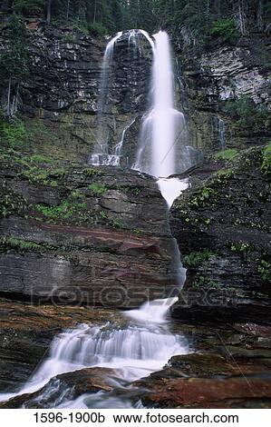 Water flowing through rocks, Virginia Falls, Us Glacier National Park, Montana, USA View Large Photo Image Stock Image - Water flowing through rocks, Virginia Falls, Us Glacier National Park, Montana, USA. Fotosearch