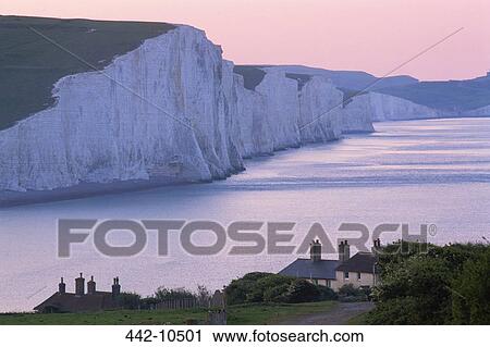Stock Image - White cliffs at the coastline, Seven Sisters, Sussex, England. Fotosearch