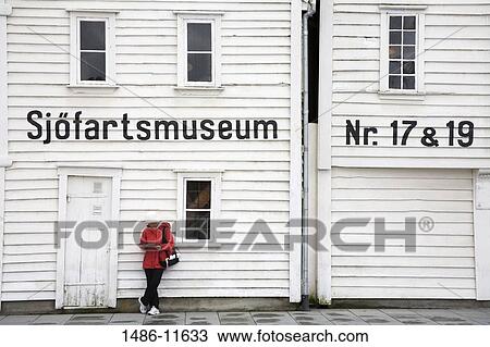 Woman leaning against the wall of a museum, Maritime Museum, Stavanger, Rogaland County, Norway View Large Photo Image Stock Image - Woman leaning against the wall of a museum, Maritime Museum, Stavanger, Rogaland County, Norway. Fotosearch