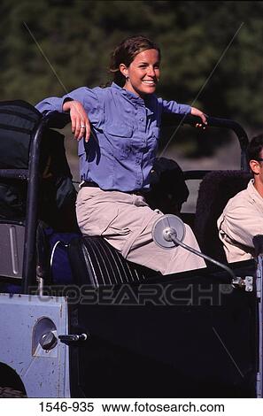 Young couple traveling in a jeep, Truckee, Nevada County, California, USA View Large Photo Image Stock Photography - Young couple traveling in a jeep, Truckee, Nevada County, California, USA. Fotosearch