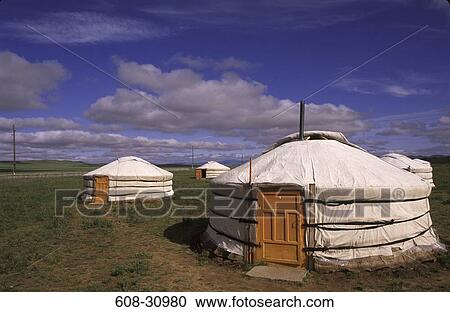 Stock Image - Yurts the traditional Mongolian residential tents in a field, Independent Mongolia. Fotosearch