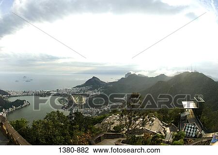 Aerial view of a cityscape with mountains, Rio de Janeiro, Brazil View Large Photo Image Stock Image - Aerial view of a cityscape with mountains, Rio de Janeiro, Brazil. Fotosearch