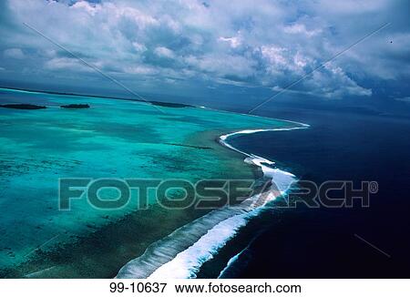 Stock Photo - Aerial view of reef, Bora Bora, Tahiti, French Polynesia. Fotosearch