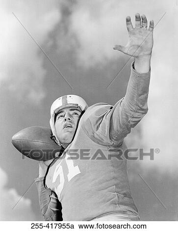 American football player throwing ball View Large Photo Image Stock Image - American football player throwing ball. Fotosearch