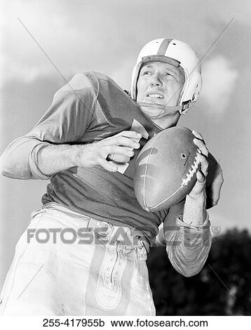 American football player throwing ball View Large Photo Image Stock Image - American football player throwing ball. Fotosearch