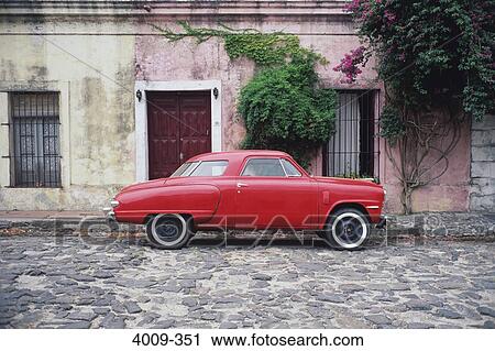 Antique car on a cobblestone road, Buenos Aires, Argentina View Large Photo Image Stock Image - Antique car on a cobblestone road, Buenos Aires, Argentina. Fotosearch