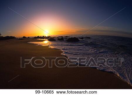 Beach at sunrise, Chileno Bay, Cabo San Lucas, Baja California, Mexico View Large Photo Image Stock Photography - Beach at sunrise, Chileno Bay, Cabo San Lucas, Baja California, Mexico. Fotosearch