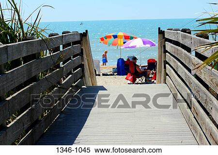 Boardwalk with tourists on the beach, Nokomis Beach, Venice, Sarasota County, Florida, USA View Large Photo Image Stock Photography - Boardwalk with tourists on the beach, Nokomis Beach, Venice, Sarasota County, Florida, USA. Fotosearch