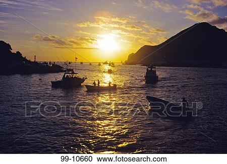 Boats in the sea at sunrise, Bisbee's Black And Blue Marlin Tournament, Cabo San Lucas, Baja California, Mexico View Large Photo Image Stock Image - Boats in the sea at sunrise, Bisbee's Black And Blue Marlin Tournament, Cabo San Lucas, Baja California, Mexico. Fotosearch
