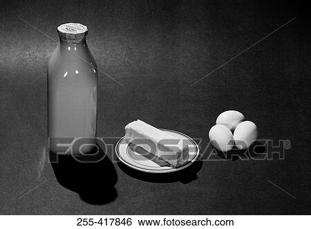 Bottle of milk, cheese and eggs View Large Photo Image Stock Photograph - Bottle of milk, cheese and eggs. Fotosearch