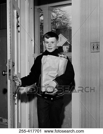 Boy bringing shopping from shop View Large Photo Image Stock Image - Boy bringing shopping from shop. Fotosearch