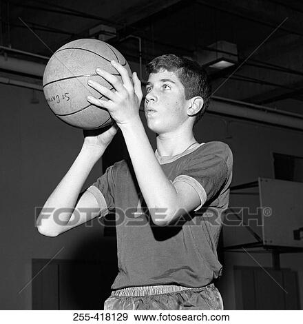 Boy playing basketball View Large Photo Image Stock Photo - Boy playing basketball. Fotosearch