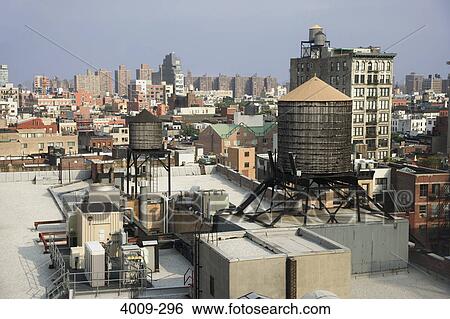 Buildings in a city, Manhattan, New York City, New York State, USA View Large Photo Image Stock Photograph - Buildings in a city, Manhattan, New York City, New York State, USA. Fotosearch