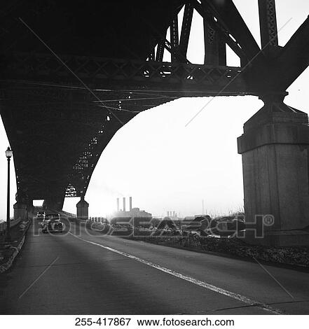 Car travelling on bridge View Large Photo Image Stock Photo - Car travelling on bridge. Fotosearch