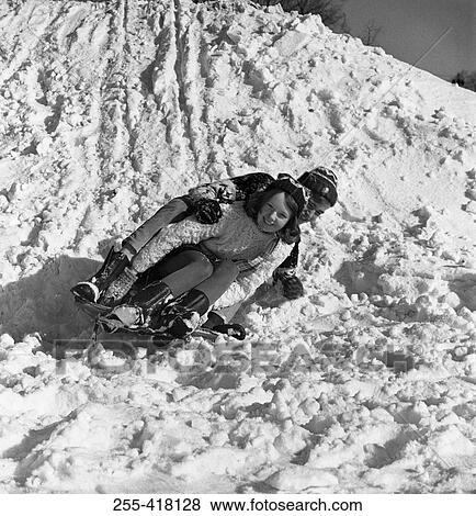 Children on sledge View Large Photo Image Stock Photo - Children on sledge. Fotosearch